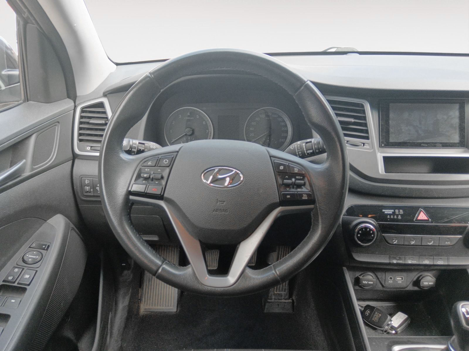 Hyundai Tucson 1.6 GDI BlueDrive Essence 4x2 - foto 10