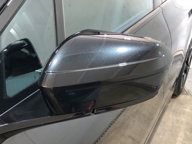 BMW iX xDrive40 color Negro. Año 2024. 240KW(326CV). Eléctrico. En concesionario Movilnorte El Plantio de Madrid