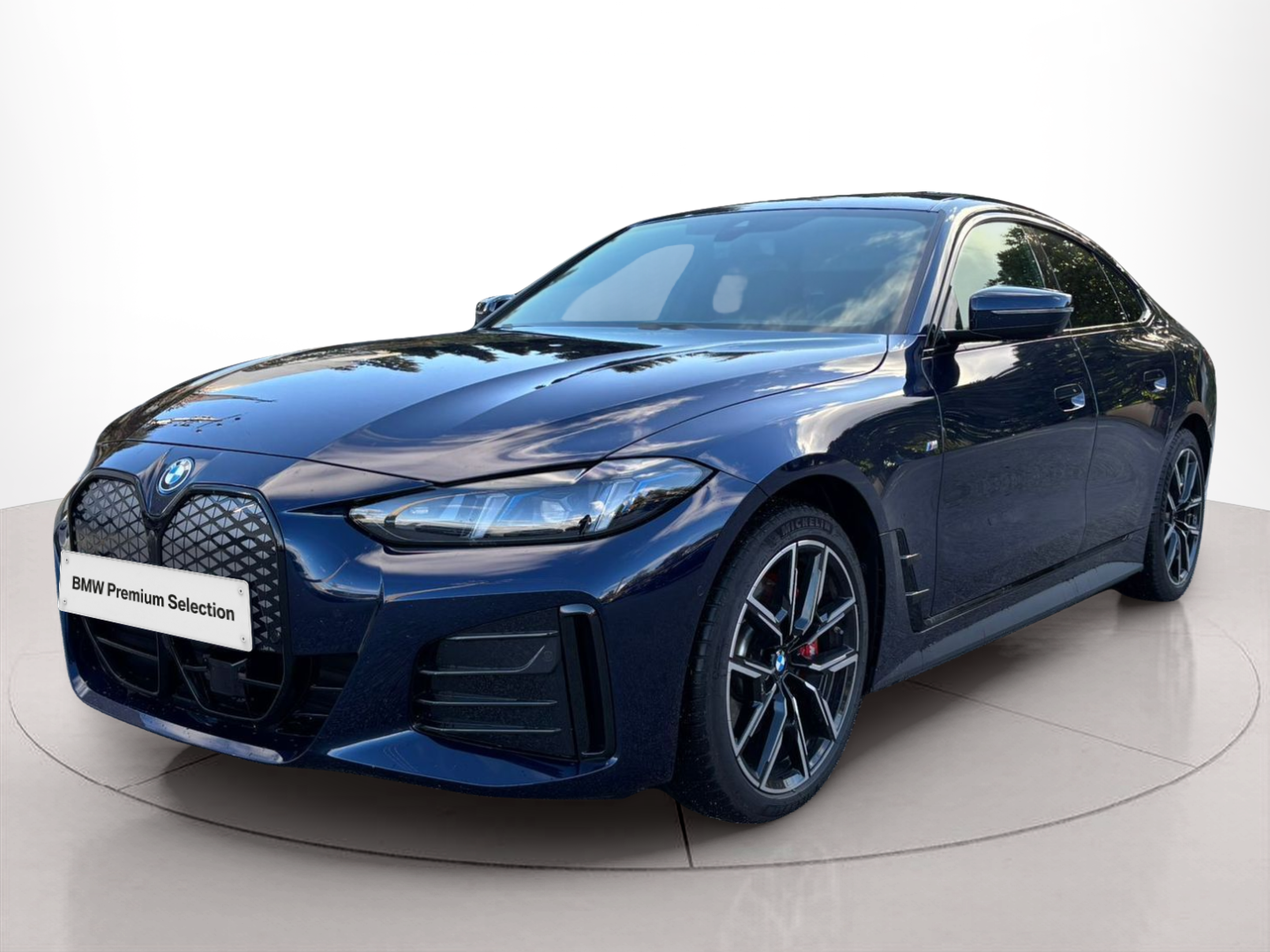 Fotos de BMW i4 i4 eDrive40 color Azul. Año 2025. 250KW(340CV). Elétrico. En concesionario A MatosCar Guarda - Comércio Automóvel, S.A. de Guarda