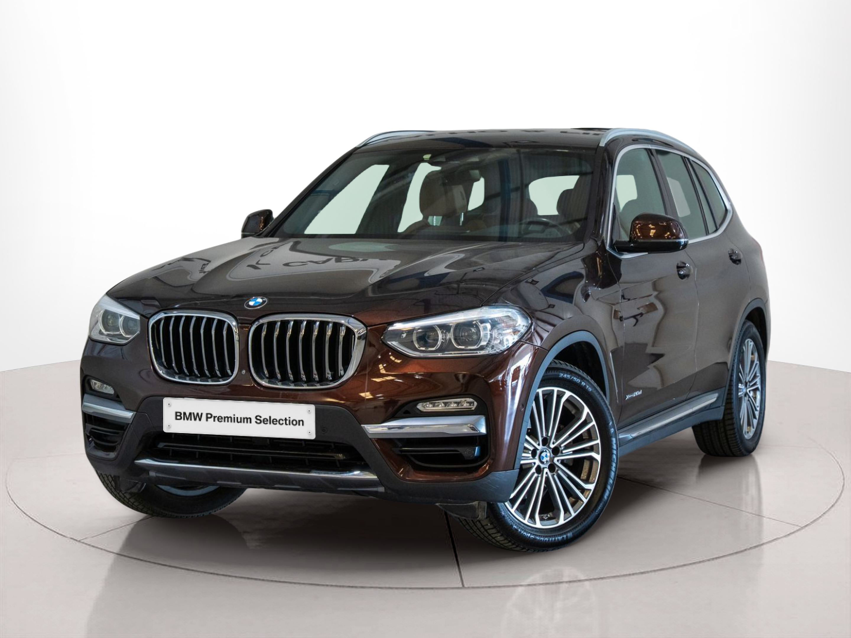 Fotos de BMW X3 xDrive20d color Marrón. Año 2018. 140KW(190CV). Diesel. En concesionario Aníbal Carvalho & Filhos, S.A. de Santarém