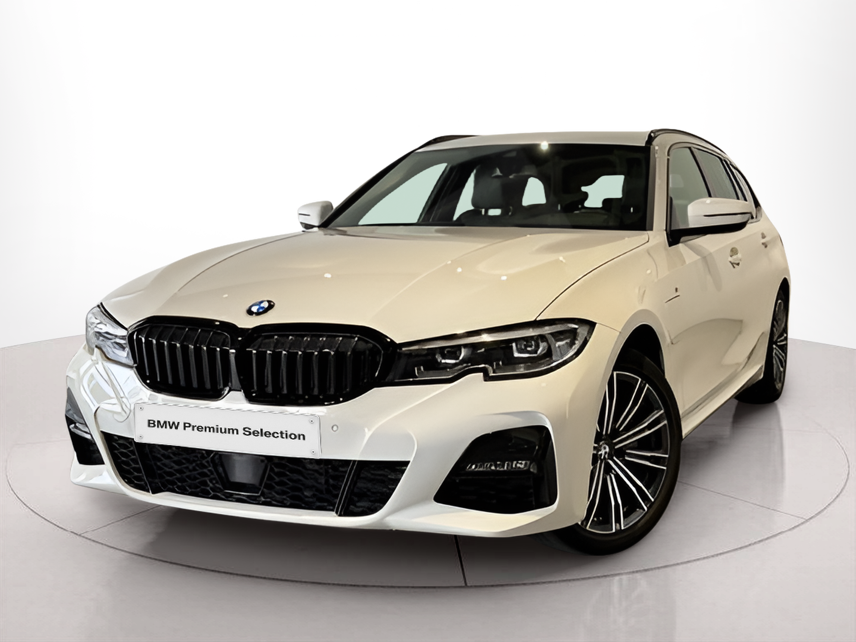 Fotos de BMW Série 3 320e Touring color Blanco. Año 2021. 150KW(204CV). Elétrico / Gasolina Híbrido. En concesionario BMcar Braga de Braga
