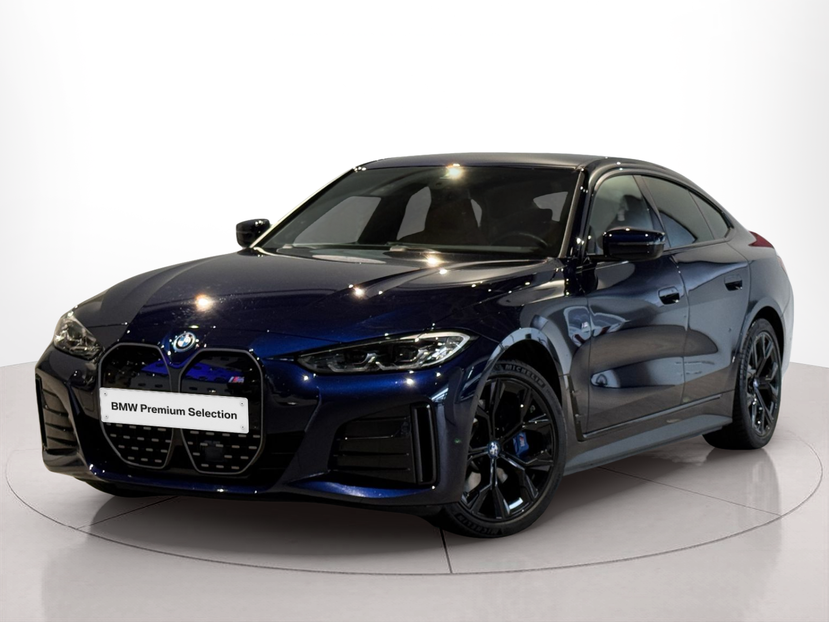 Fotos de BMW i4 i4 eDrive40 color Azul. Año 2022. 250KW(340CV). Elétrico. En concesionario BMcar Braga de Braga