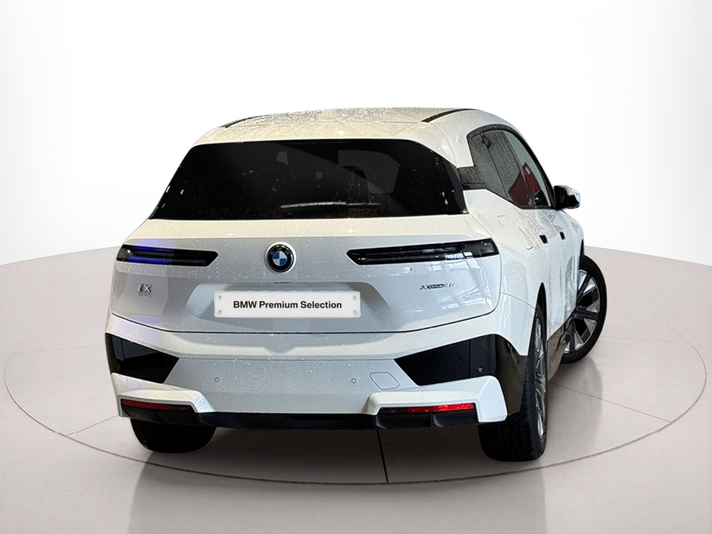 BMW iX xDrive40 color Blanco. Año 2024. 240KW(326CV). Elétrico. En concesionario BMcar Braga de Braga