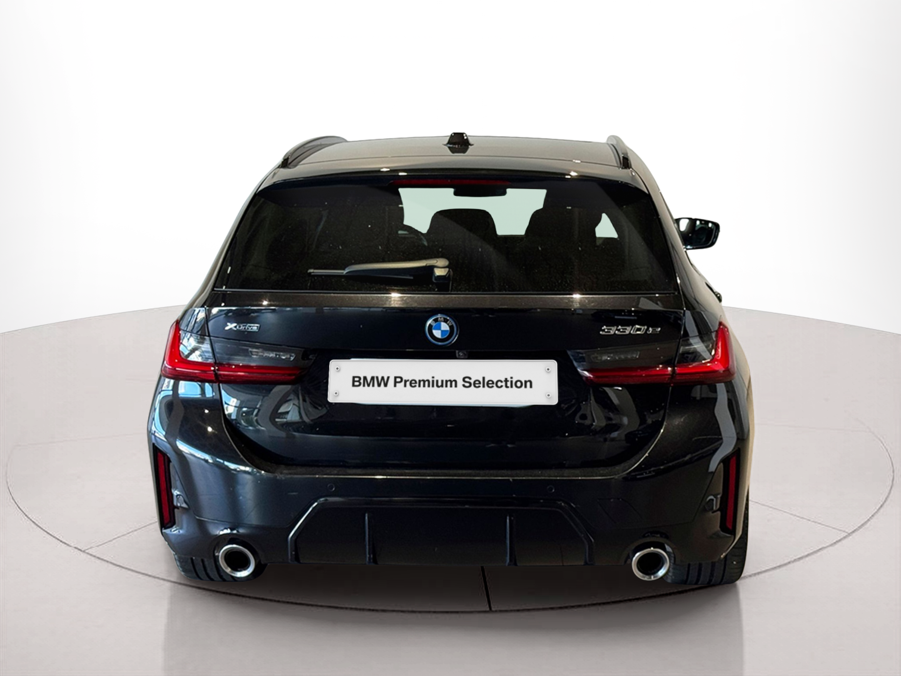 BMW Série 3 320e Touring color Negro. Año 2023. 215KW(292CV). Elétrico / Gasolina Híbrido. En concesionario BMcar Braga de Braga