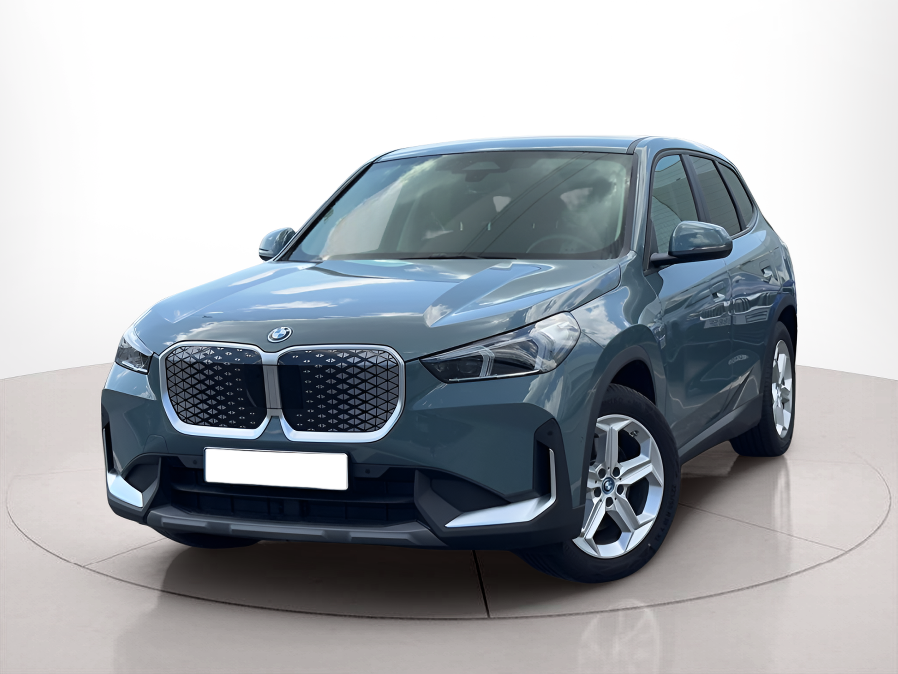 Fotos de BMW iX1 xDrive30 color Verde. Año 2024. 230KW(313CV). Elétrico. En concesionario BMcar Barcelos de Barcelos