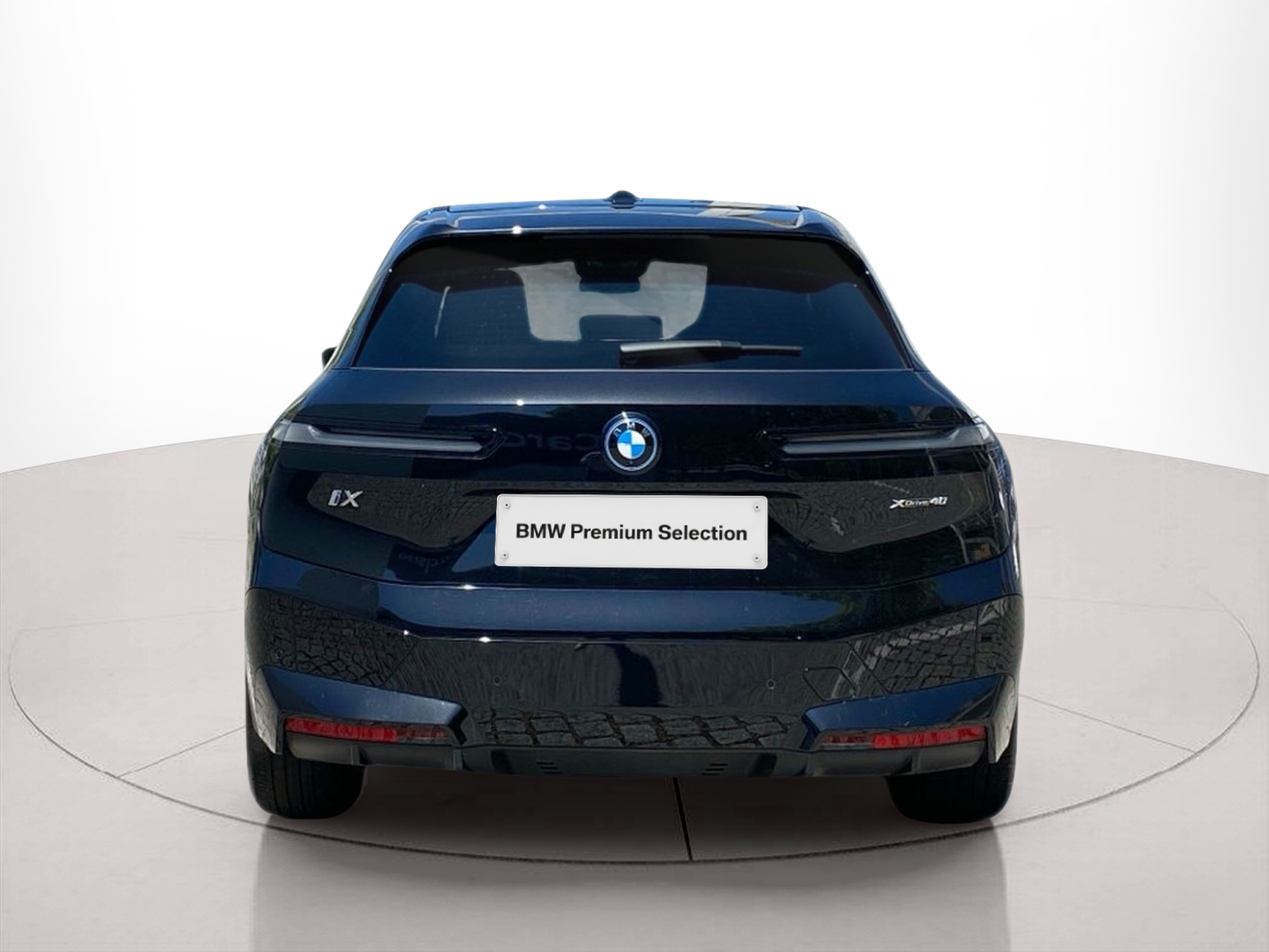 BMW iX xDrive40 color Negro. Año 2024. 240KW(326CV). Elétrico. En concesionario Caetano Baviera Lisboa de Lisboa