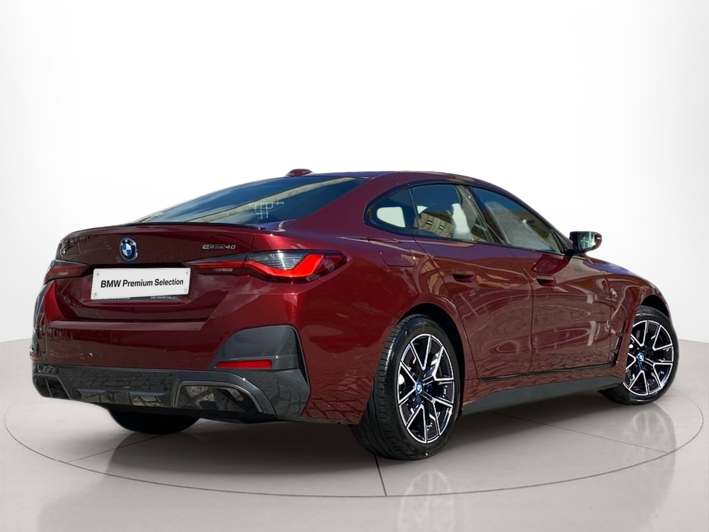 BMW i4 i4 eDrive40 color Rojo. Año 2024. 250KW(340CV). Elétrico. En concesionario Caetano Baviera Lisboa de Lisboa