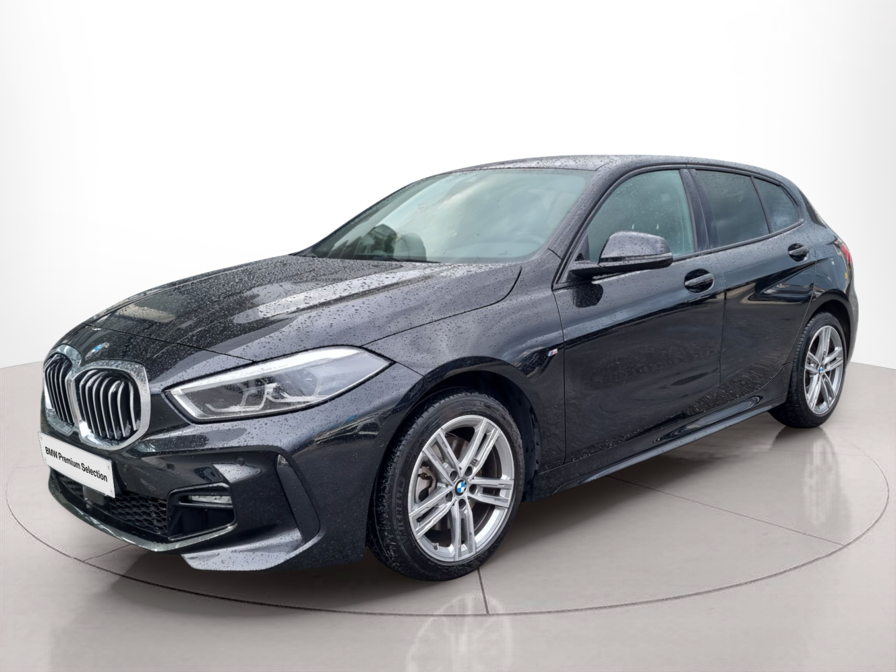 Fotos de BMW Série 1 116d color Negro. Año 2024. 85KW(116CV). Diesel. En concesionario Caetano Baviera Aveiro de Aveiro