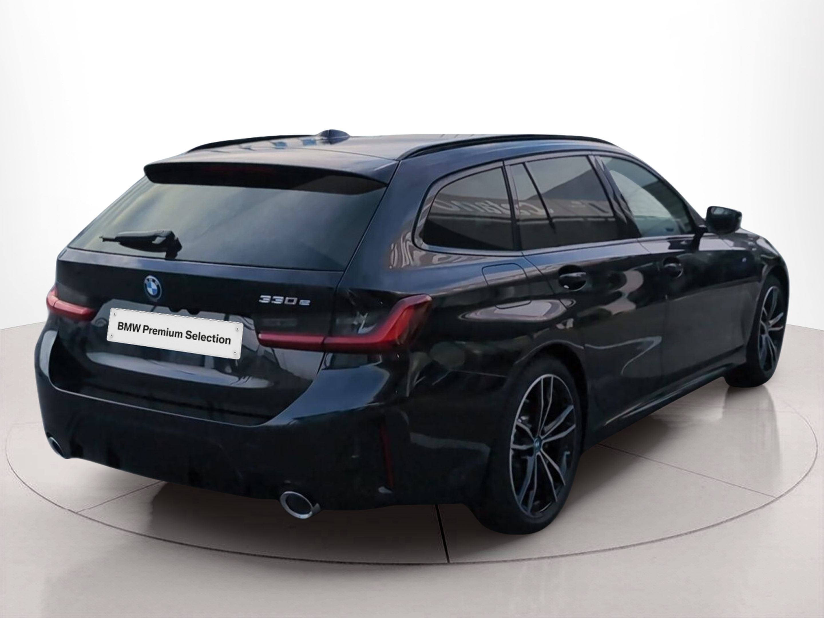 BMW Série 3 320e Touring color Negro. Año 2024. 215KW(292CV). Elétrico / Gasolina Híbrido. En concesionario Caetano Baviera Aveiro de Aveiro