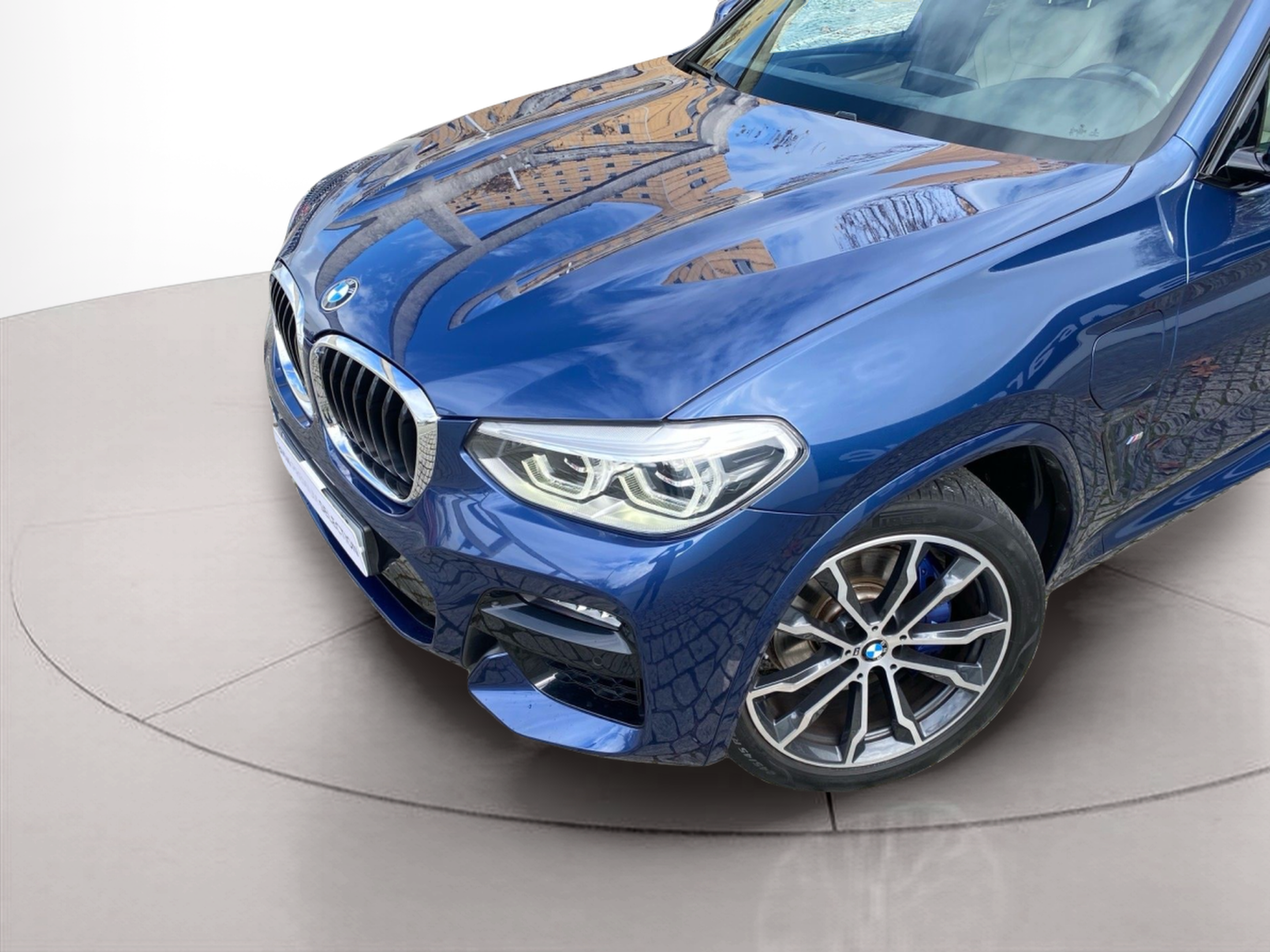 BMW X3 xDrive30e color Azul. Año 2021. 215KW(292CV). Elétrico / Gasolina Híbrido. En concesionario Caetano Lisboa de Lisboa