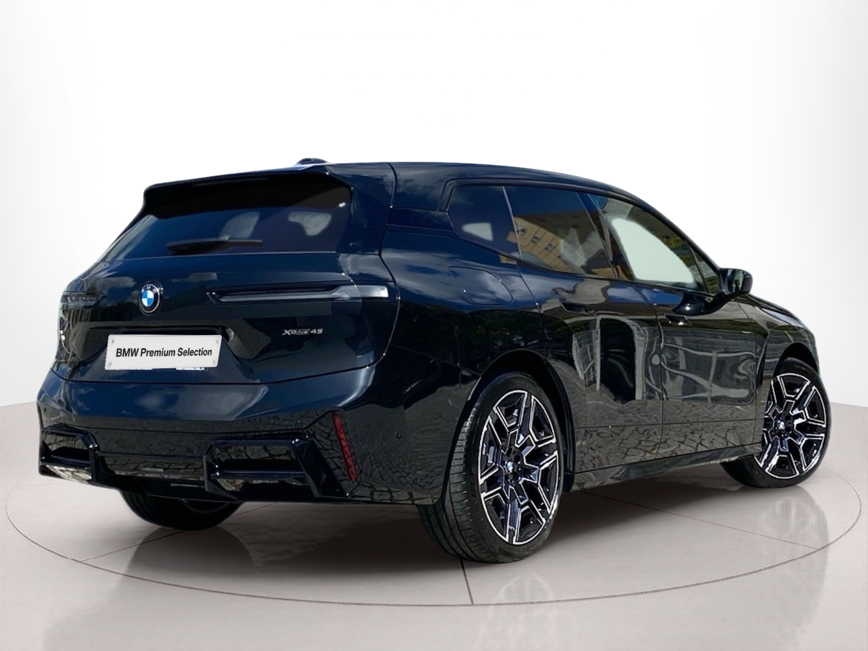 BMW iX xDrive45 color Negro. Año 2025. 300KW(408CV). Elétrico. En concesionario Caetano Lisboa de Lisboa