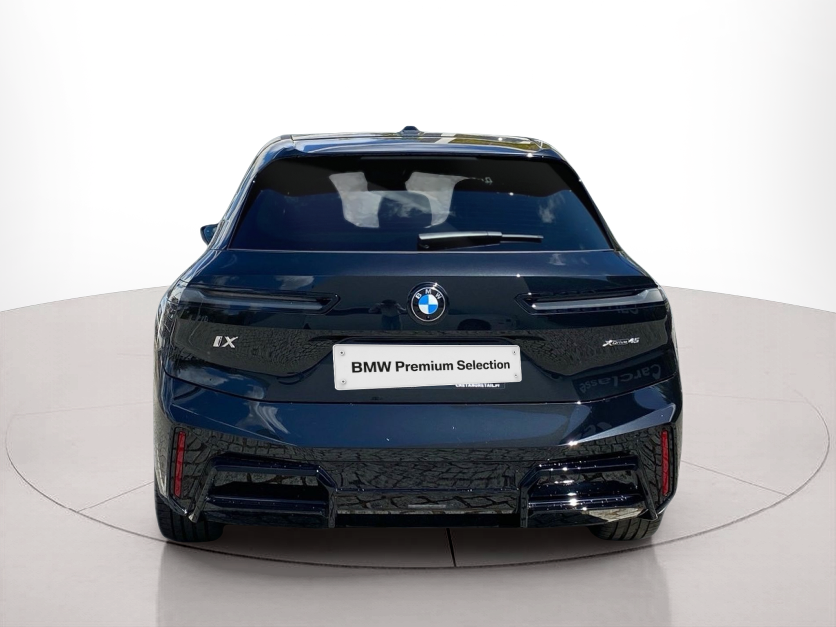 BMW iX xDrive45 color Negro. Año 2025. 300KW(408CV). Elétrico. En concesionario Caetano Lisboa de Lisboa