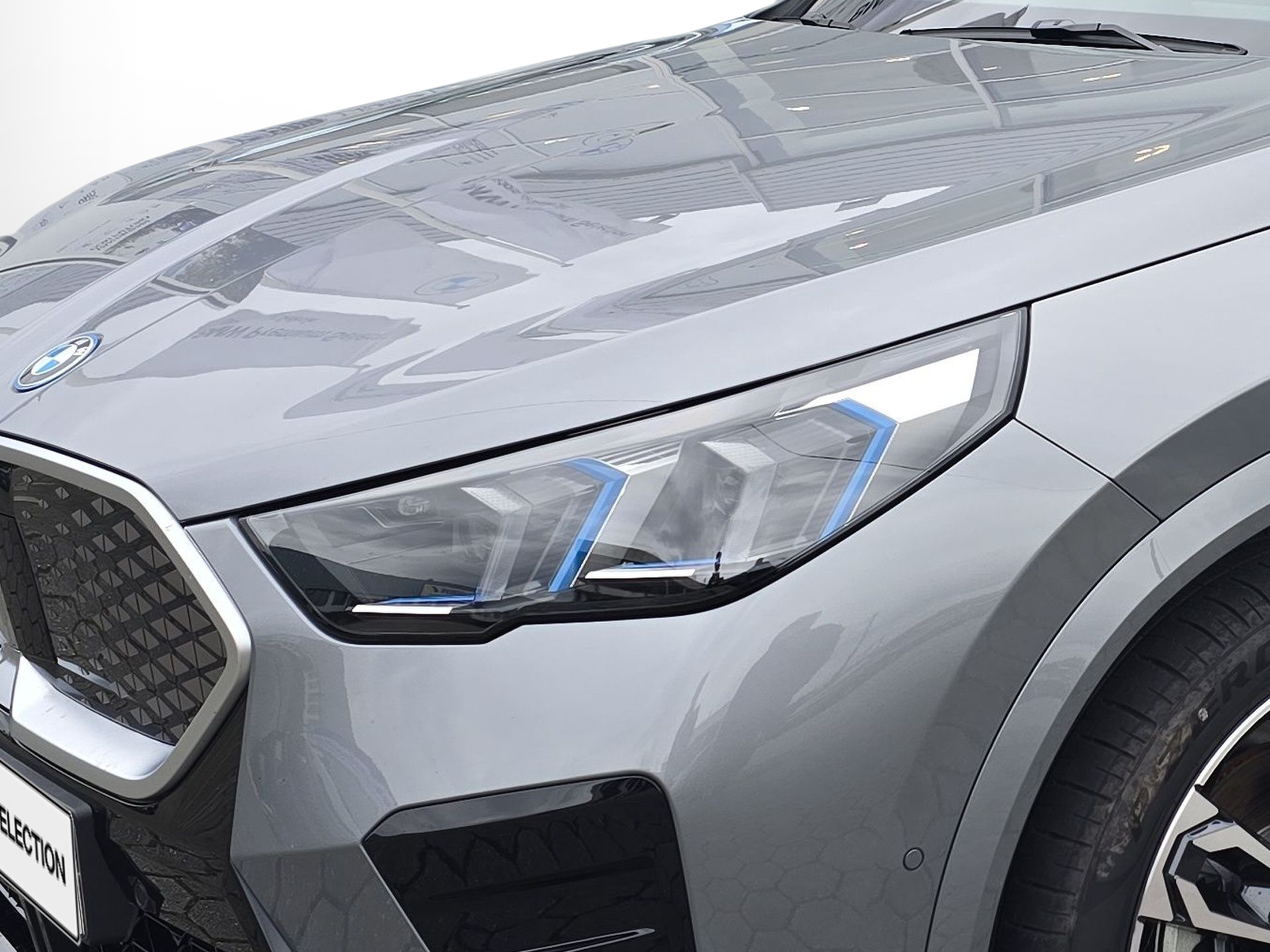 BMW iX2 eDrive20 color Gris. Año 2025. 150KW(204CV). Elétrico. En concesionario Caetano Baviera Aveiro de Aveiro