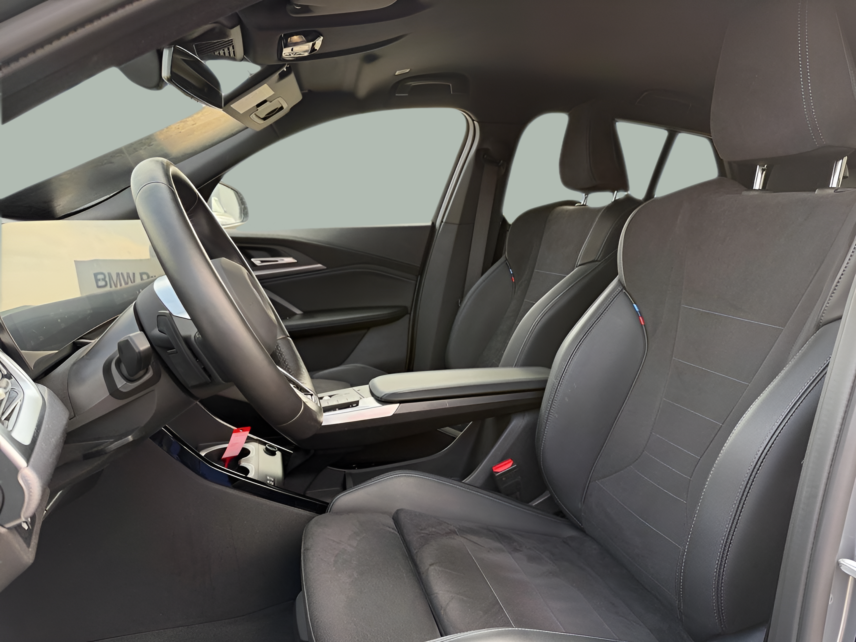 BMW iX2 eDrive20 color Gris. Año 2025. 150KW(204CV). Elétrico. En concesionario Caetano Portimão de Portimão