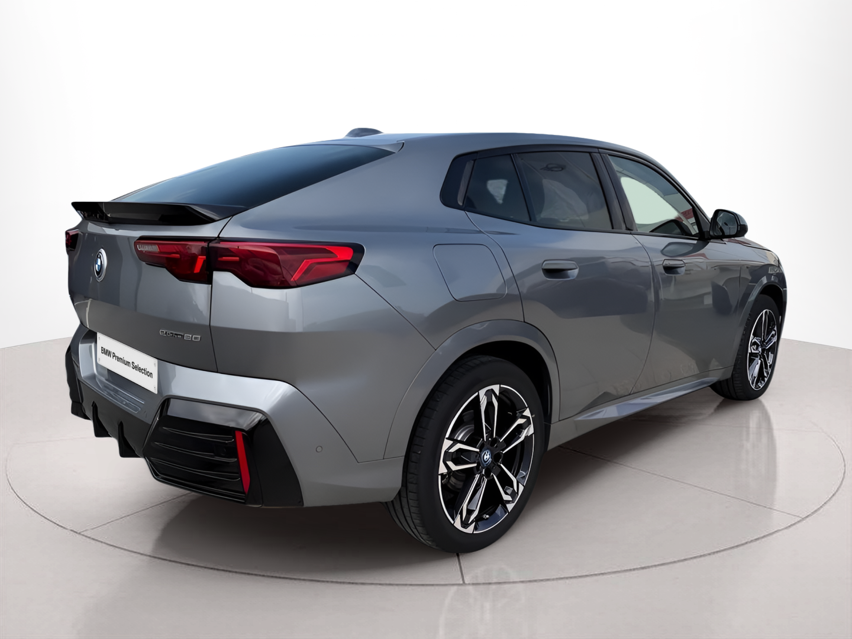 BMW iX2 eDrive20 color Gris. Año 2025. 150KW(204CV). Elétrico. En concesionario Caetano Portimão de Portimão