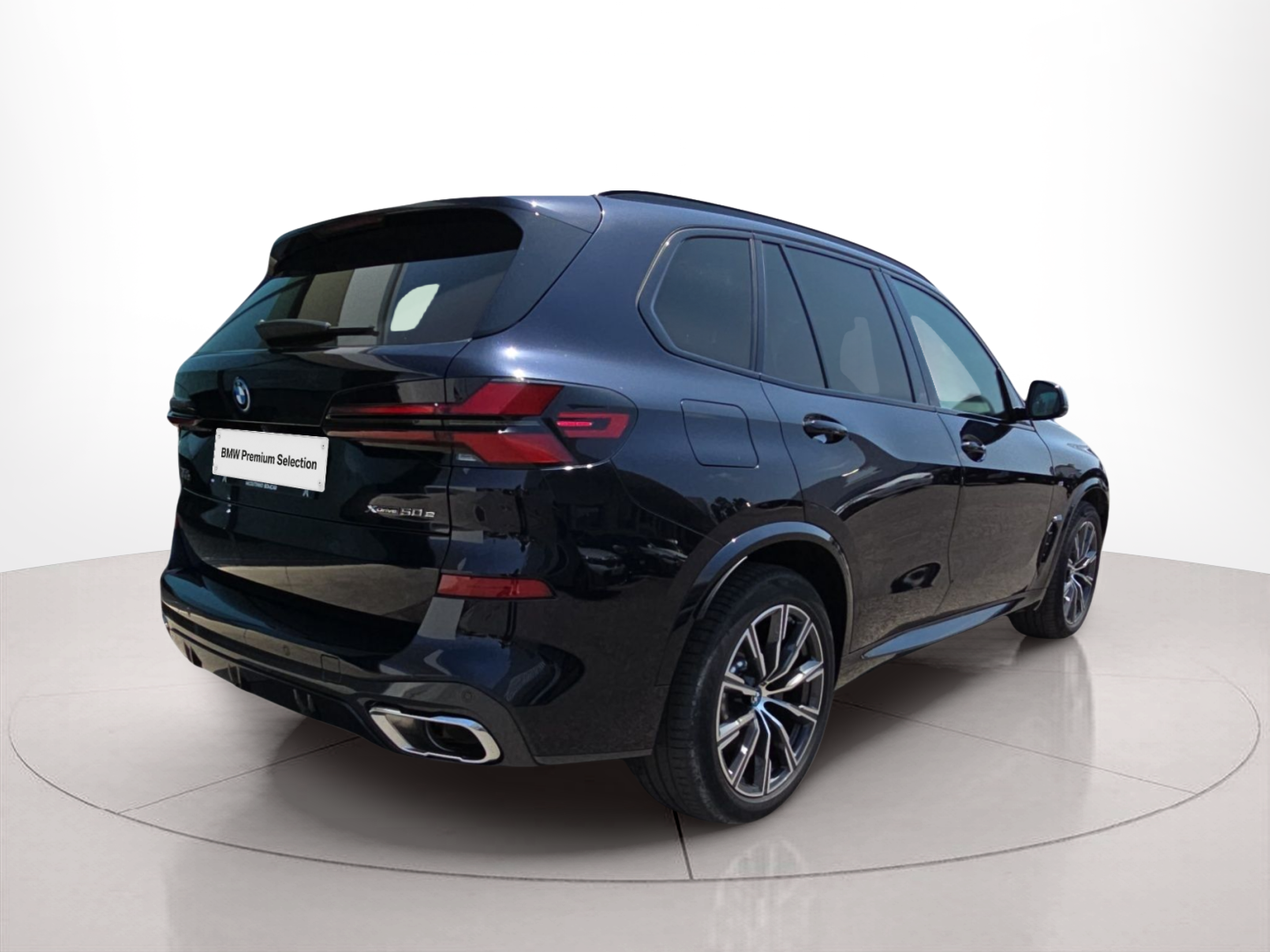 BMW X5 xDrive50e color Negro. Año 2024. 360KW(489CV). Elétrico / Gasolina Híbrido. En concesionario MCoutinho Bomcar Leiria de Leiria