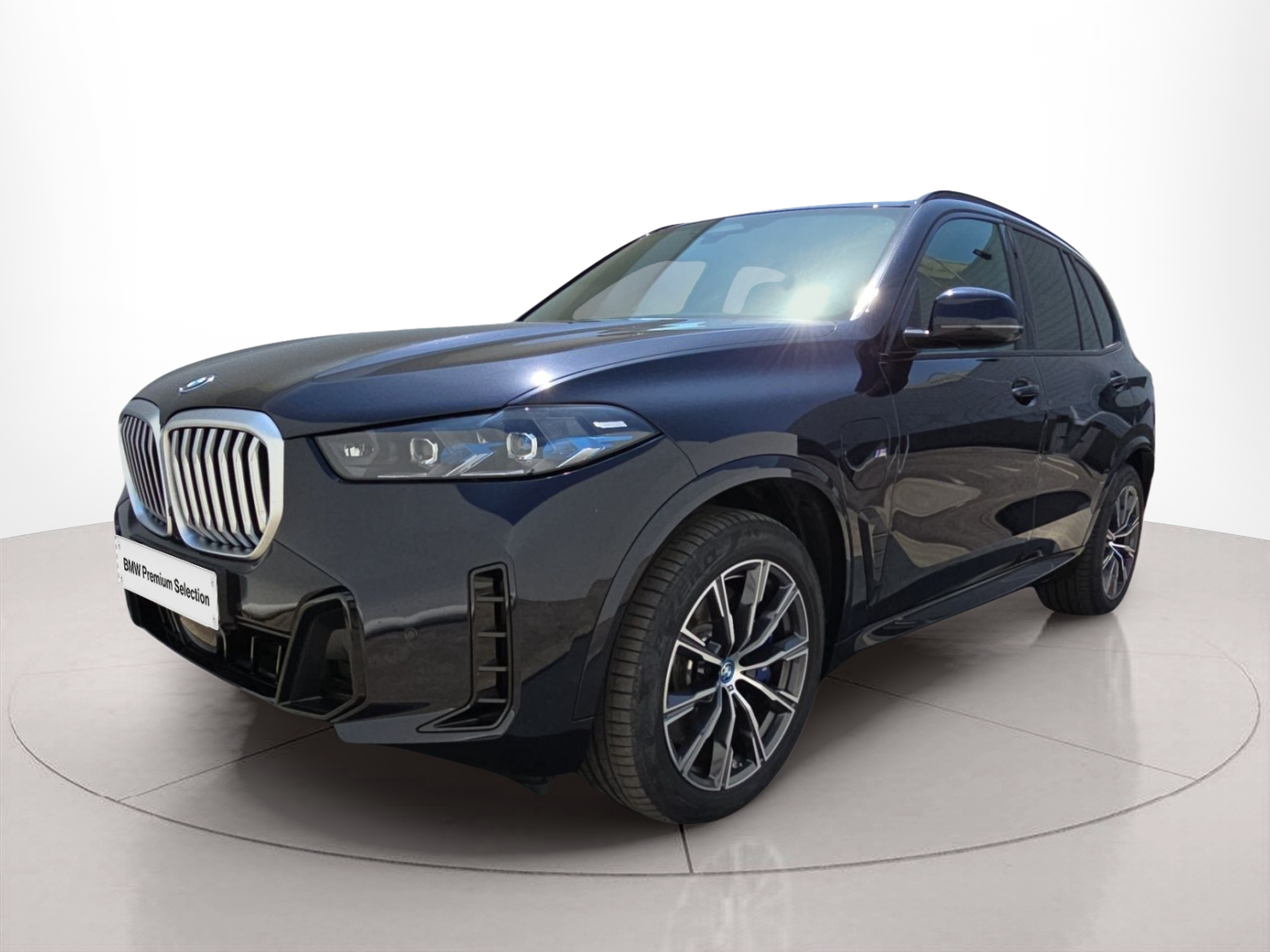 Fotos de BMW X5 xDrive50e color Negro. Año 2024. 360KW(489CV). Elétrico / Gasolina Híbrido. En concesionario MCoutinho Bomcar Leiria de Leiria