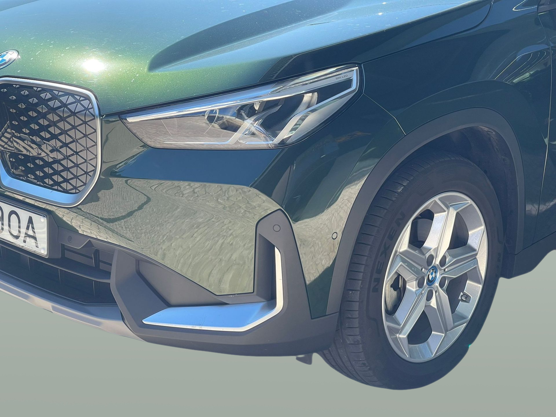 BMW iX1 eDrive20 color Verde. Año 2024. 150KW(204CV). Elétrico. En concesionario Santogal Carnaxide de Oeiras