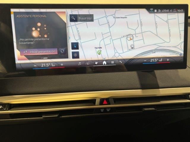 BMW iX xDrive50 color Negro. Año 2024. 385KW(523CV). Eléctrico. En concesionario Quadis Munich (Manresa) de Barcelona